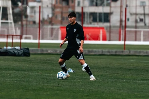 soccer player training on pitch